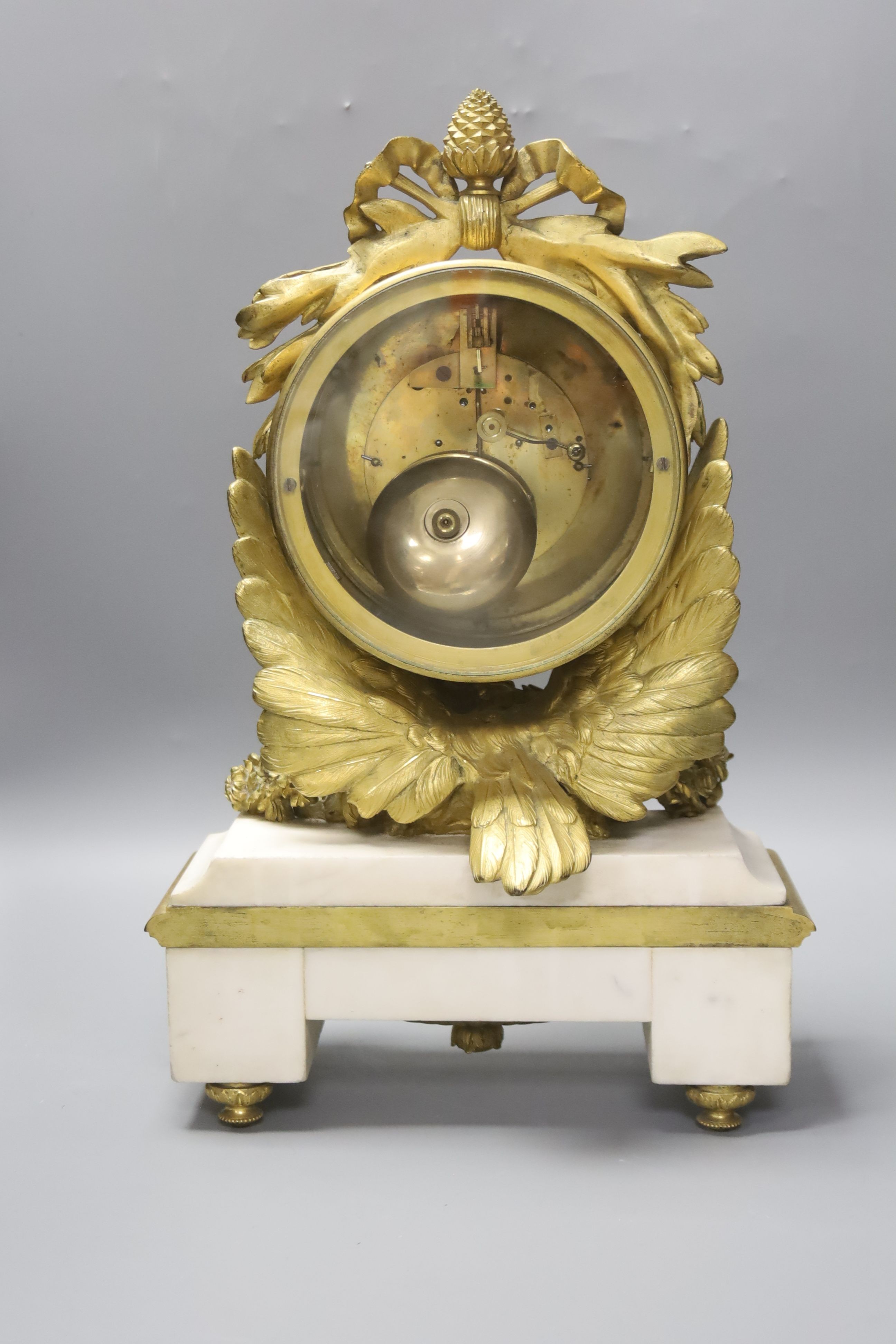 A French ormolu and white marble mantel clock, the case late 18th century, the movement late 19th century 41 cm high